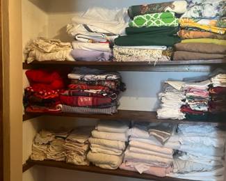 Lots of linen bedding and table sets