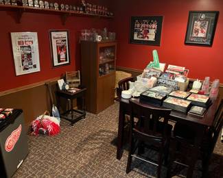 Room loaded with many pieces of Michigan sports memorabilia — lots of Red Wings memorabilia, and also MSU, Detroit Tigers and more. Many autographed pieces.