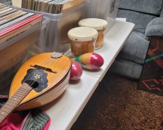 Records, bongo, bowl back mandolin 