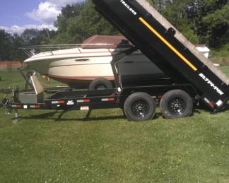 2024 dump trailer with ramps.  Uses 2  5/16 ball. Load cap 15,400 lb gvw. 