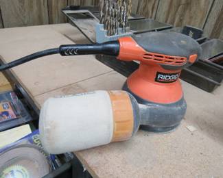 many small sanders, etc