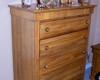 Wooden dresser with décor 