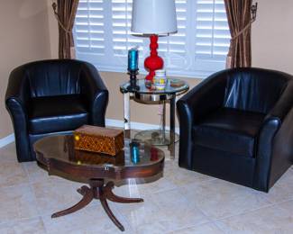 Leather matching chairs, elegant antique coffee table