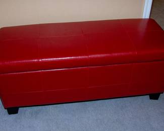 Vibrant red end of bed storage/bench
