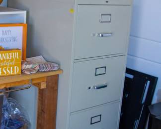 Filing cabinet and Philips TV