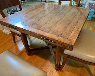 5. Guy Chaddock Plank Top Game Table (36" x 36" x 29") w/ Drop Leaves (51" round) and 4 Chairs (22" x 20" x 34")