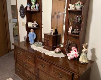Spare bedroom dresser, with creepy hand painted ceramics and weird crying doll! In fair condition but lower quality materials
