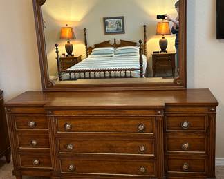 You will love this elegant set of bedroom furniture! It features unique drawer pulls. Check them out at the sale.