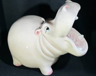 This vintage Fitz & Floyd happy hippo is a piggy bank!