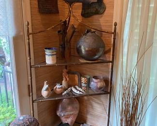 Brass and glass shelf supports the arts-do you?