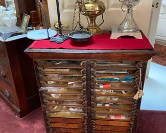 This Victorian spool cabinet is the coolest piece of furniture at this sale.