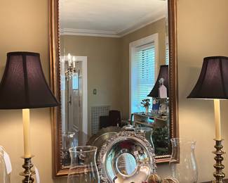 Handsome mirrors and lamps