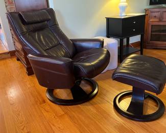 A pair of these Super Comfortable Recliners With Ottomans