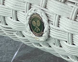 Each piece has a medallion reading THE CHAMPIONSHIPS WIMBLEDON surrounding crossed rackets and a ball, and the seat cushions with corresponding decoration.