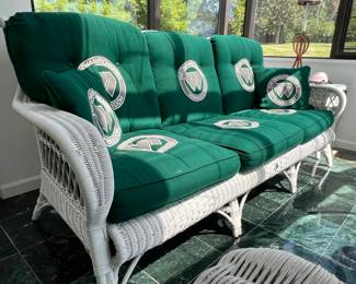 SUNROOM IS FULL OF STUNNING WHITE WICKER FURNITURE FROM THE "WIMBLEDON COLLECTION OF WICKER BY HENRY LINK"...Set includes a glass top garden table with 4 chairs, a rocker and side table, a 3 seat sofa and glass top coffee table, 2 arm chairs and an ottoman and and a glass top lamp table