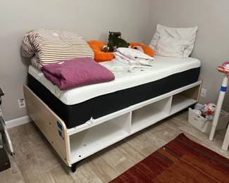 Twin bed frame and practically brand new memory foam twin mattress.