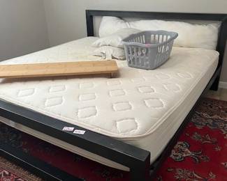 King size bed frame, black metal frame.