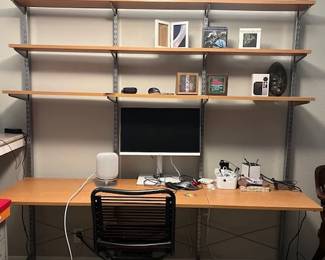 Elfa shelving unit, work chair, lots of electronics and homepod.