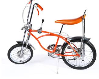 Lot 79
Schwinn Sting-Ray Orange Krate bicycle 56" L x 42"H x 27"W