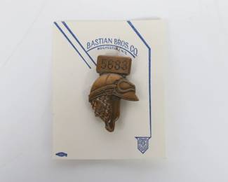 Lot 22
1953 Indianapolis Motor Speedway bronze pit badge 2 3/4"H x 2 1/4"W (card)