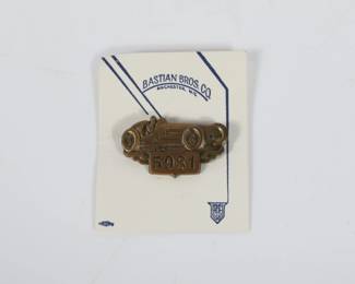 Lot 24
1954 Indianapolis Motor Speedway Bronze pit badge 2 3/4"H x 2 1/4"W (card)  1954 Indianapolis Motor Speedway Bronze pit badge
This 1954 Indianapolis Motor Speedway Bronze pit badge #5981 is a rare and collectible piece of racing history. Crafted from bronze, this badge features intricate detailing and the iconic Indianapolis Motor Speedway logo. A must-have for any racing enthusiast or memorabilia collector, this pit badge is a unique and valuable addition to any collection.Marked "Indianapolis Motor Speedway" and "Bastian Bros. Co. Rochester, NY" on back of pin.