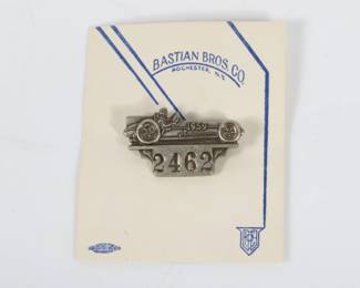 Lot 29
1959 Indianapolis Motor Speedway silver pit badge 2 3/4"H x 2 1/4"W (card)  1959 Indianapolis Motor Speedway silver pit badge
This 1959 Indianapolis Motor Speedway silver pit badge #2462 is a rare and collectible piece of racing history. Crafted with intricate detail, this badge symbolizes the prestige and excitement of the iconic event. Made of high-quality silver, it exudes elegance and sophistication, making it a must-have for any racing enthusiast or memorabilia collector. Perfect for display or as a unique gift, this pit badge is a timeless treasure that captures the spirit of the legendary race.