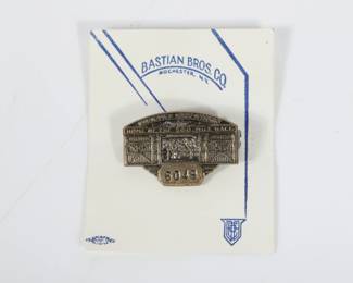 Lot 26
1956 Indianapolis Motor Speedway bronze pit badge #6049 2 3/4"H x 2 1/4"W (card)