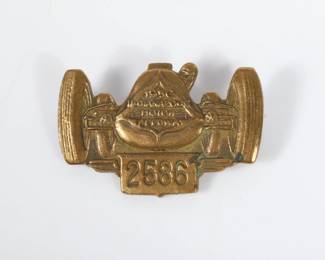 Lot 19
1950 Indianapolis Motor Speedway Bronze pit badge #2586 1 1/4"H x 1 3/4"W