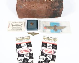Our auction features an impressive array of Indianapolis 500 memorabilia, including vintage Indy 500 tickets from 1929, 1930, and the 1950s, IMS pit badges, silver pit badge displays, signed racing helmets, Hulman glassware, and an extensive collection of NASCAR memorabilia. These items capture the rich history and excitement of one of the most iconic racing events in the world.