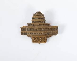 Lot 18
1949 Indianapolis Motor Speedway Bronze pit badge 1 1/2"H x 1 3/4"W