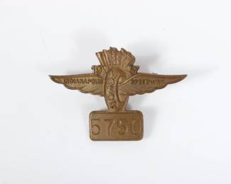 Lot 27
1957 Indianapolis Motor Speedway bronze pit badge #5750 1 1/4"H x 1 3/4"W