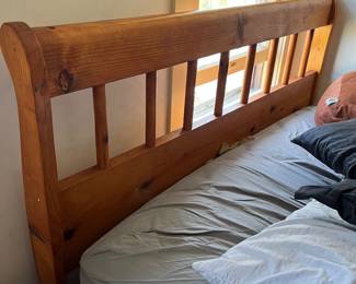 Full size wood bead frame with rails. No mattress