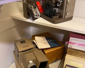 Vintage Bell & Howell 8mm projector and 35mm, 553555 slide projector by Revere