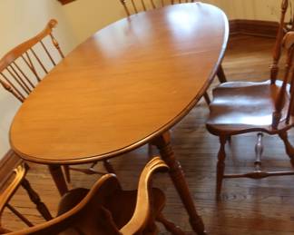 dinette  set    59"  x  41"   and 4  chairs   (also  two  leaves)