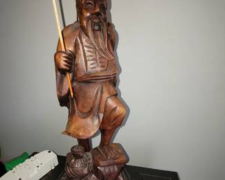 Carved wood table lamp