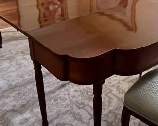 These consoles are perfect against a wall in a foyer and then used as a dining table