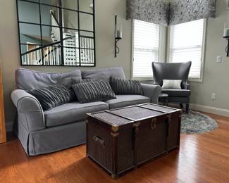 Grey Slipcover Sofa, Trunk and Faux Leather Armchair 