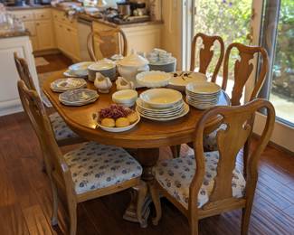 Ethan allen small dining table with blue and white chairs. Table converts to a round table. So cute and functional!