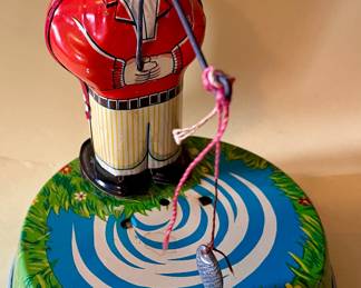 ANTIQUE BOY FISHING TIN LITHO TOY - By SY