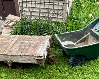 An Antique Wood and Iron Cart and a Plastic Garden Cart