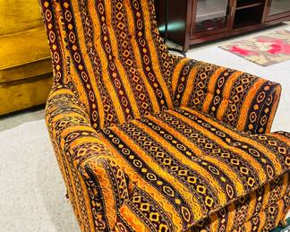 Stunning orange and black MCM living room rocker 