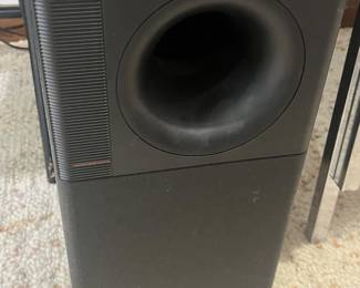 Bose surround sound system with 4 speakers, 2 stands, and woofer. 