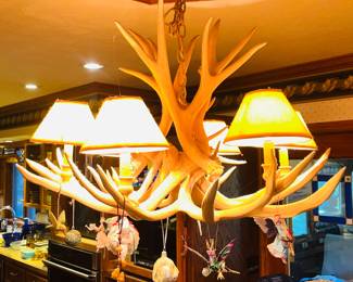 This sale has a few super neat outdoorsy pieces scattered throughout the house, including some animal pelts, deer antlers, peasant feathers, and a few other surprises 😉