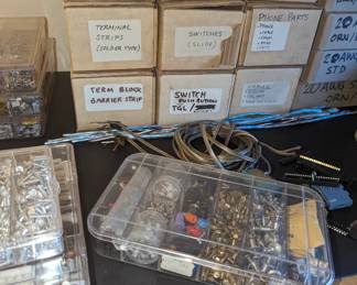Electrical engineer? Or maybe a hobby. This is a collection of electrical components, well organized and labeled. Some of the items include hookup wires, indicators, connectors, cable, plugs, fuse holders, switches, terminal strips, wiring, solder accessories etc. See photos for more items or call BFF with any questions.