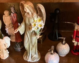 Close up of Angels, pump bottles & toy soldier 