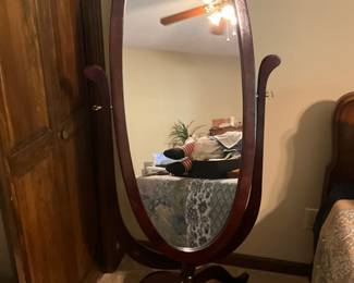 Wood oval mirror on stand 