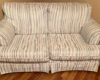White Loveseat with Threads of Blue & Pink 5’
