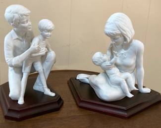 Vintage Kaiser Germany Bisque Porcelain Mother w/Child & Father w/Child on Wood Base 8” - leg has repair 
