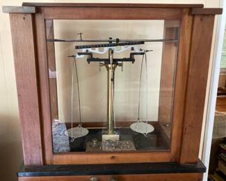 1926 Voland and Sons Student Analytical Scale with Weights, Slate Floor, Mahogany Wood 16.5”h x 16.25”w x 9.5”d 

