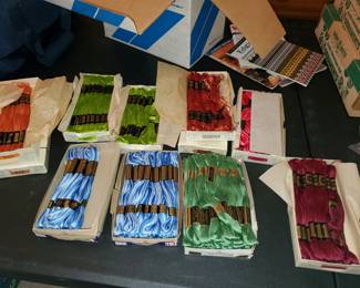 Many skeins of embroidery threads and yarn...